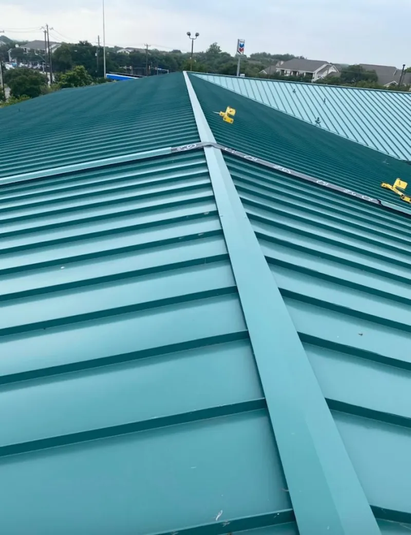 Green commercial metal roof ridge and valley for Metal Roof Repair in Round Rock