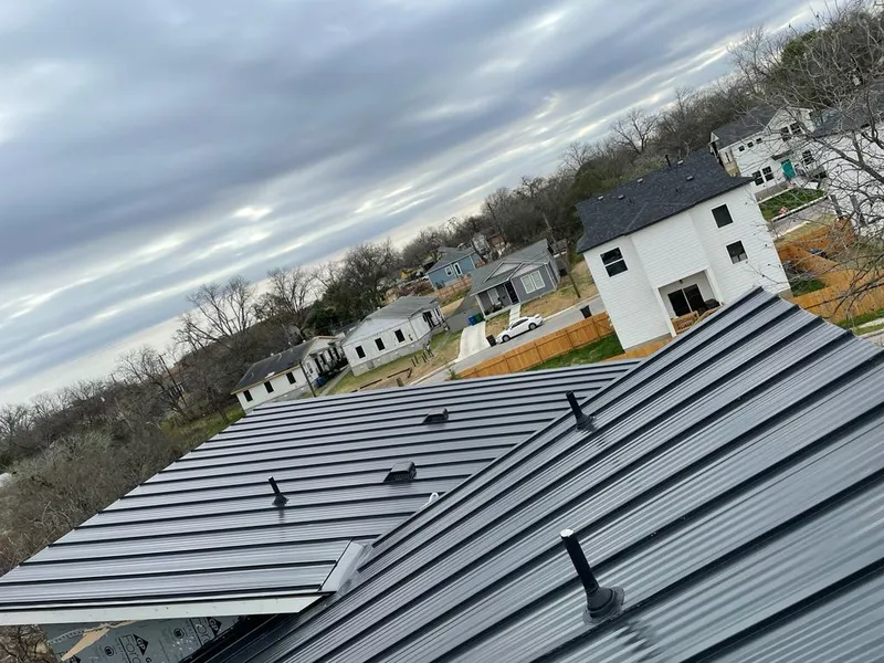 Standing seam metal roof panels with vents for Skylight Repair in Round Rock